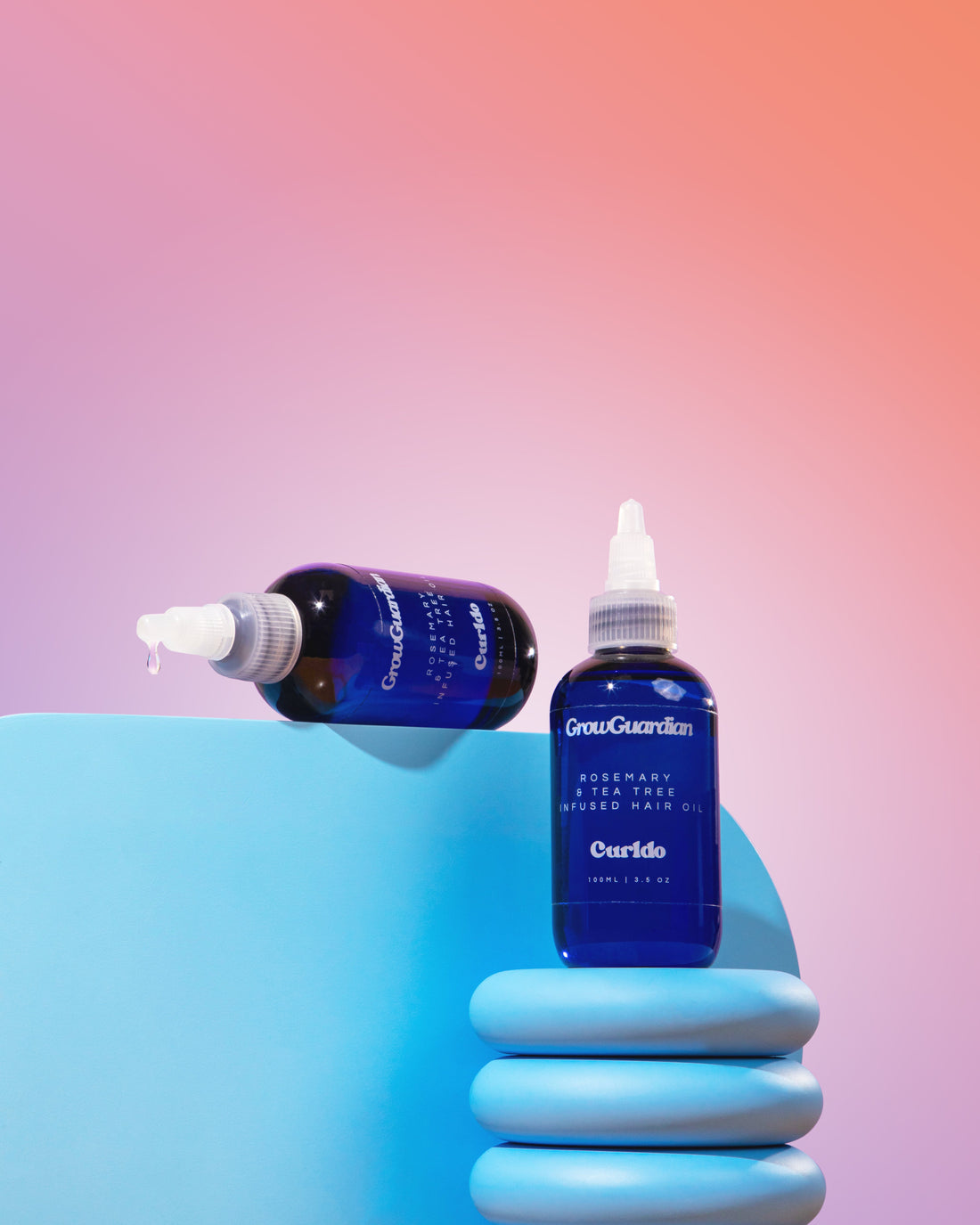 GrowGuardian hair oil by Curldo formulated with rosemary and tea tree for healthy curls