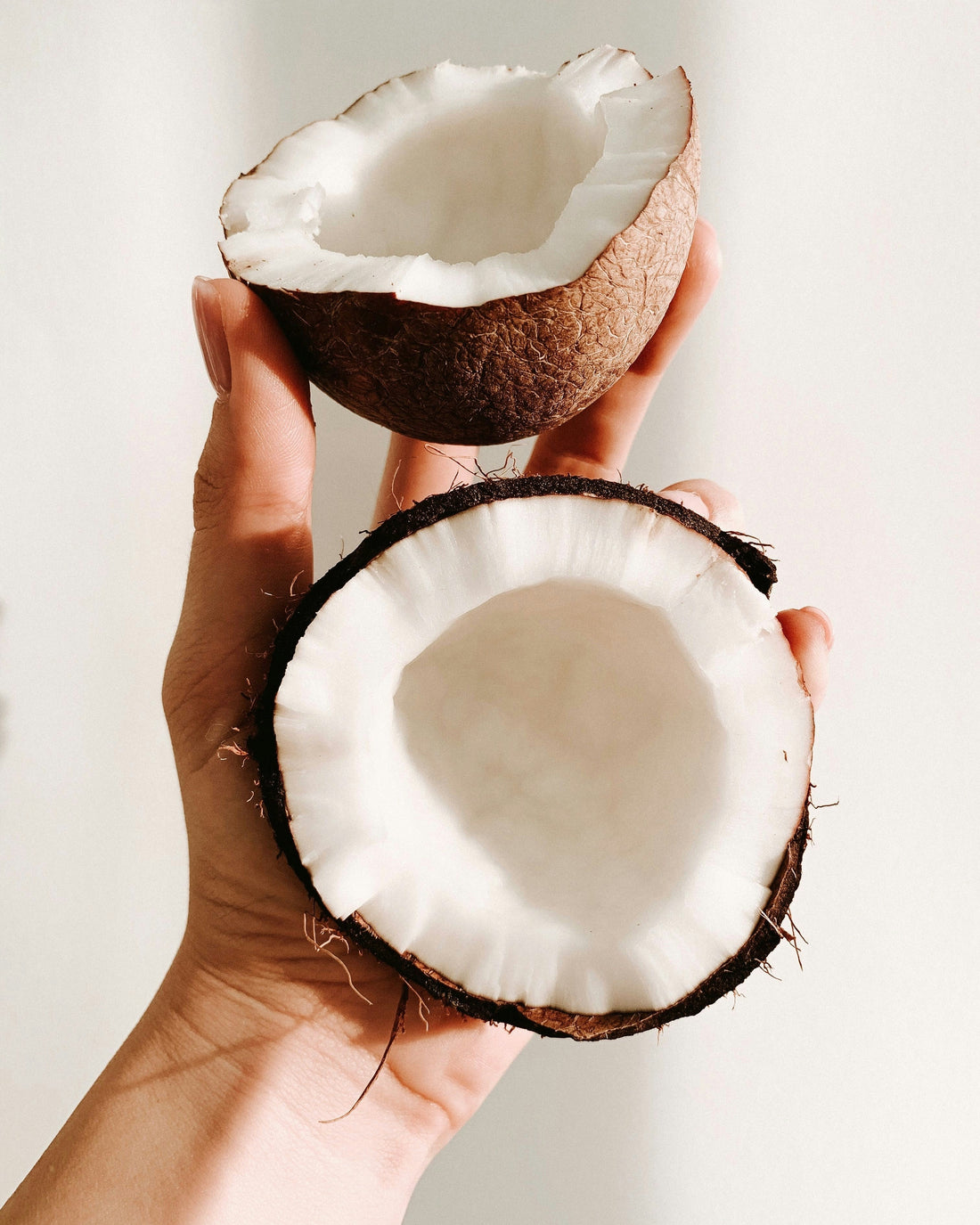Coconut Oil for Curly Hair: Magic Benefits & Tips - Curldo