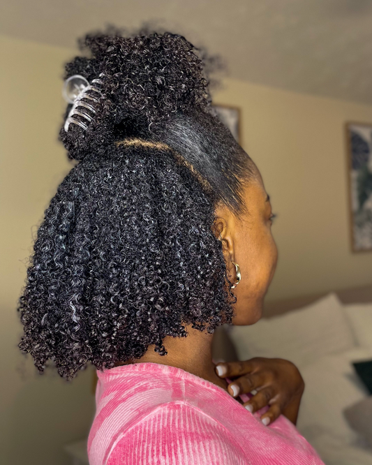 Defined curls after refresh routine with half-up style and claw clip